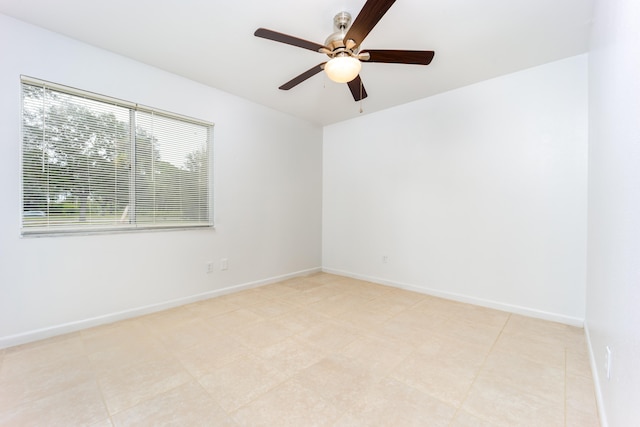 unfurnished room featuring ceiling fan