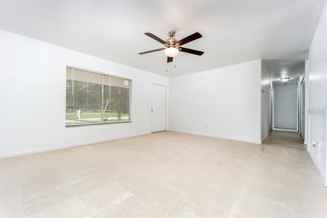 spare room featuring ceiling fan