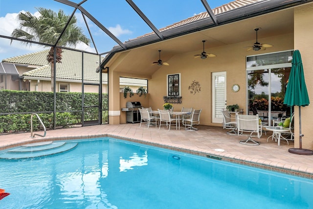 view of swimming pool featuring a patio, a lanai, ceiling fan, and a grill