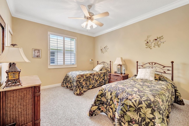 bedroom with ceiling fan, carpet floors, and crown molding