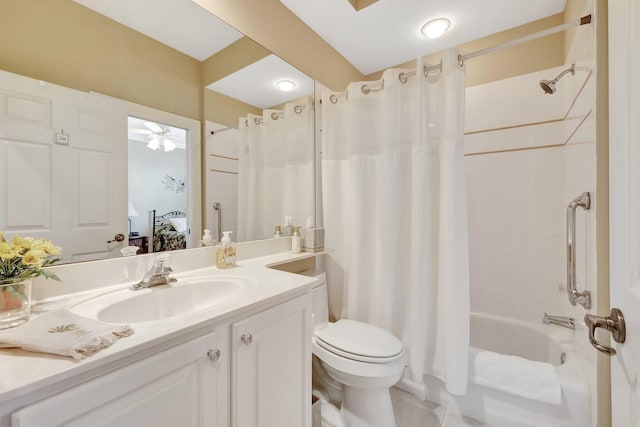 full bathroom with shower / bath combo with shower curtain, ceiling fan, vanity, and toilet