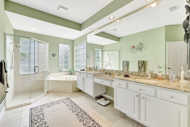 bathroom with vanity, shower with separate bathtub, and tile patterned floors