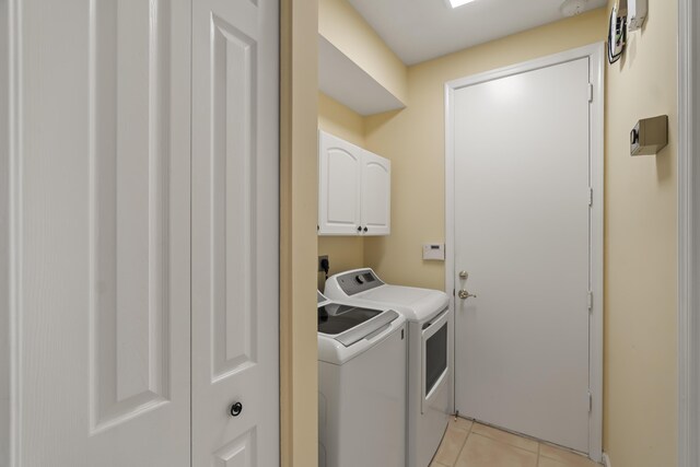 washroom featuring light tile patterned floors and ceiling fan