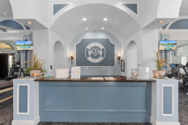 interior space featuring dark stone countertops