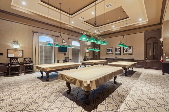 game room with light carpet, pool table, a high ceiling, and a raised ceiling