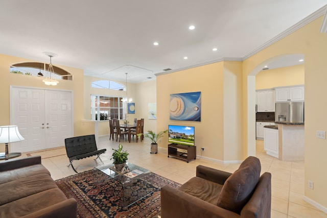 living room featuring crown molding and light tile patterned floors