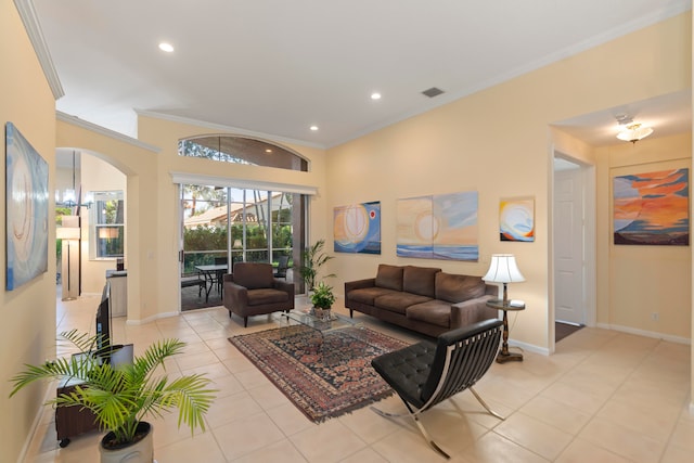 living room with crown molding and light tile patterned floors