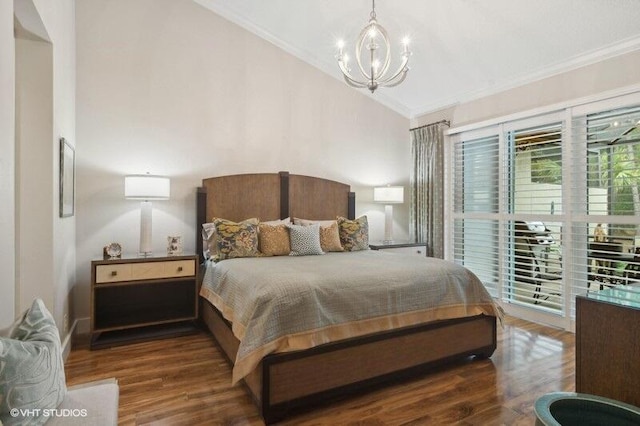 bedroom featuring ornamental molding, vaulted ceiling, a notable chandelier, and dark hardwood / wood-style floors