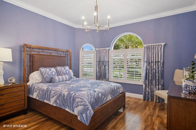 bedroom featuring crown molding, dark hardwood / wood-style floors, and a chandelier