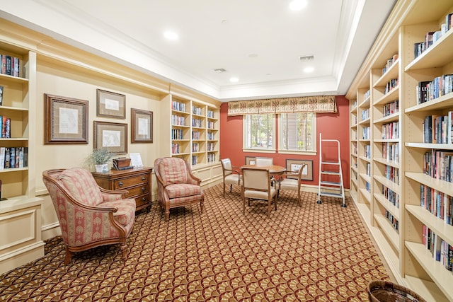 10103 Wild Quail Dr, Port Saint Lucie, FL 34986 - living area featuring visible vents, built in features, crown molding, and carpet floors