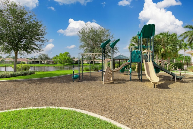 10103 Wild Quail Dr, Port Saint Lucie, FL 34986 - communal playground featuring a water view and fence