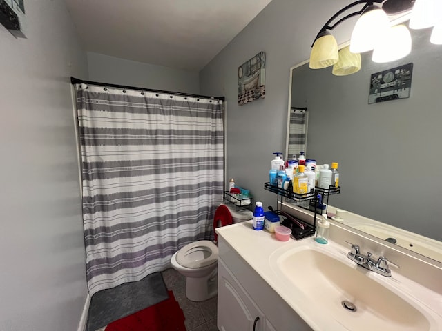 bathroom featuring tile patterned flooring, vanity, toilet, and a shower with curtain