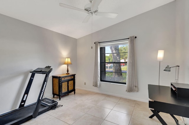 home office with light tile patterned flooring, vaulted ceiling, and ceiling fan