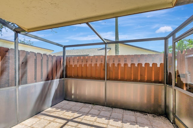 view of patio / terrace with glass enclosure