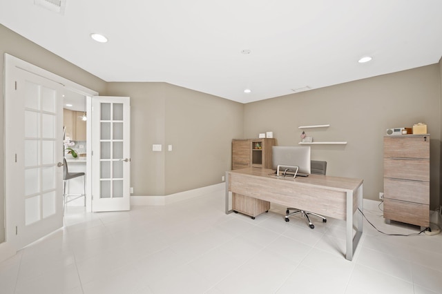 tiled office space featuring french doors