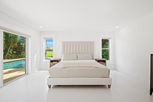 tiled bedroom with access to outside