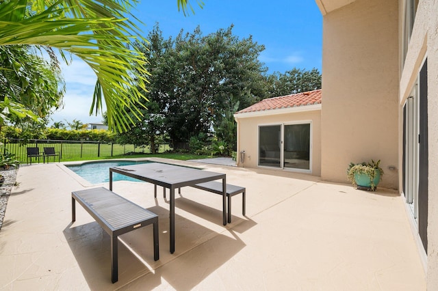 view of swimming pool featuring a patio