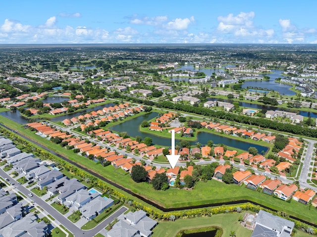 drone / aerial view with a water view