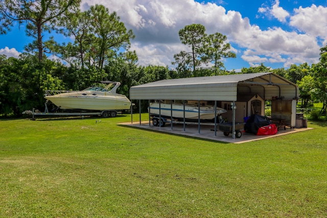 view of yard with a carport