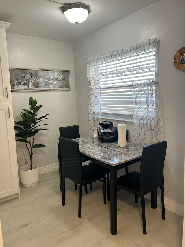 dining room featuring light wood-type flooring