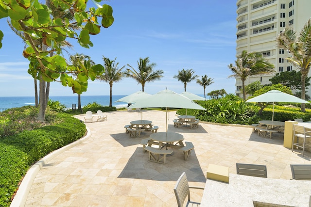 view of patio / terrace with a water view