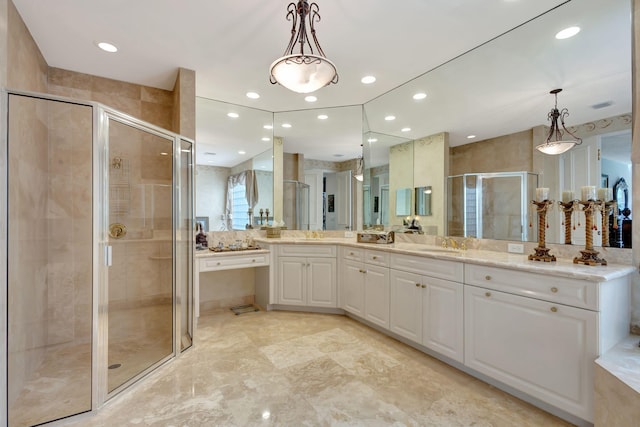 full bathroom featuring a stall shower, recessed lighting, visible vents, and vanity