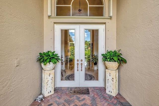 doorway to property featuring french doors