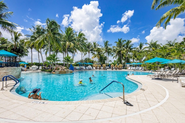 view of swimming pool featuring a patio area