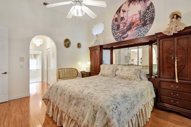 bedroom featuring light wood-type flooring and ceiling fan