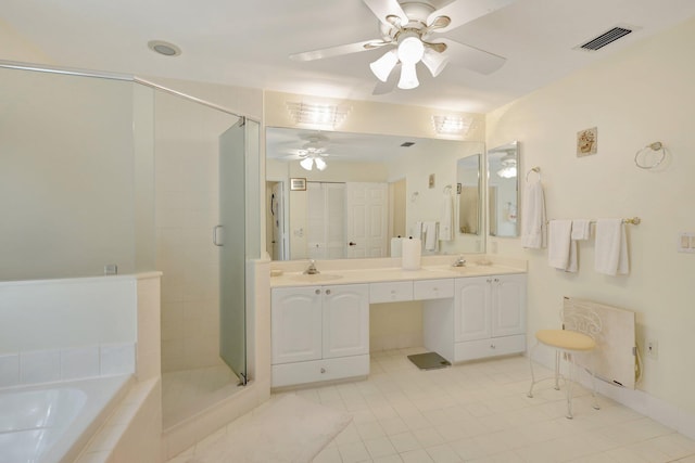 bathroom with ceiling fan, vanity, radiator heating unit, shower with separate bathtub, and tile patterned flooring