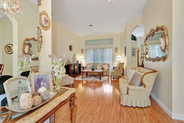 interior space with a fireplace and hardwood / wood-style floors