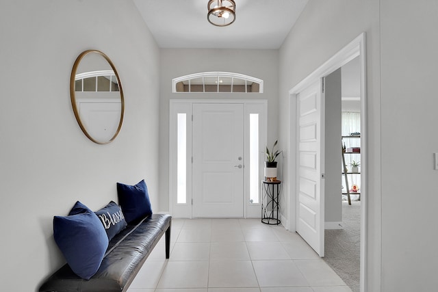 foyer featuring light tile patterned flooring