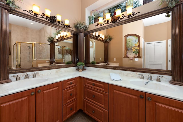 bathroom featuring vanity, tile patterned floors, and a shower with shower door