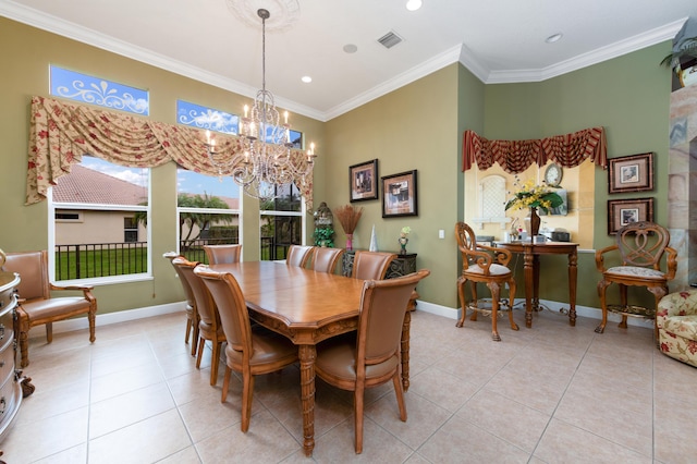 dining area with crown molding, light tile patterned floors, and a notable chandelier