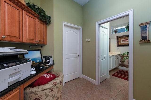 office with light tile patterned floors