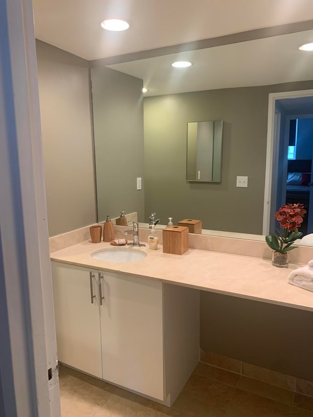 bathroom featuring vanity and tile patterned floors