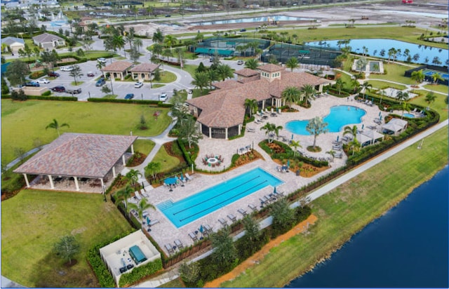 bird's eye view with a water view