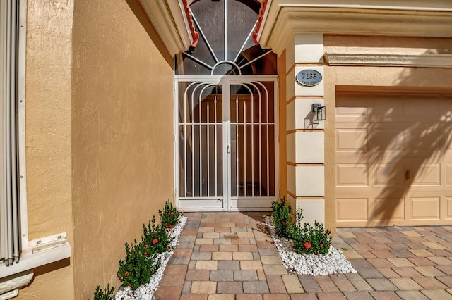 entrance to property with a garage