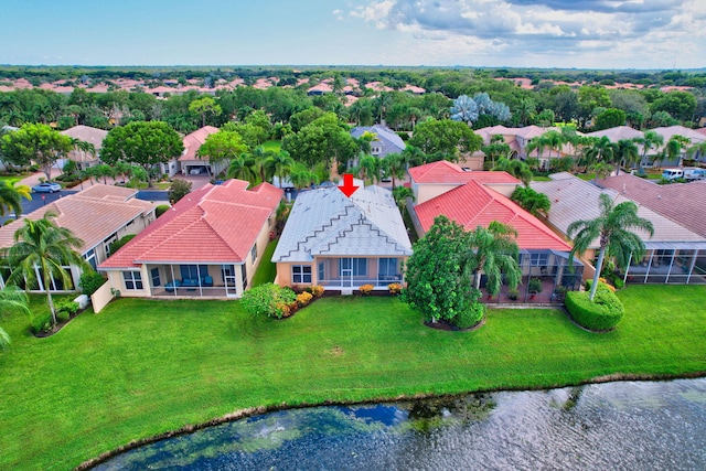 bird's eye view with a water view