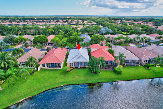 drone / aerial view with a water view