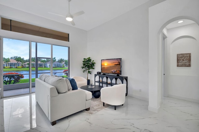 living room featuring ceiling fan