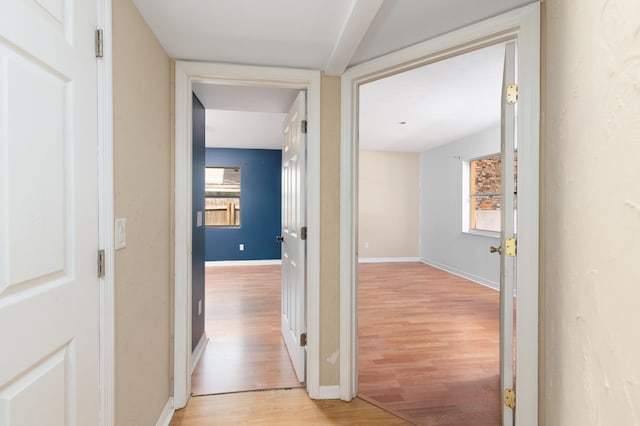 corridor featuring light wood-type flooring