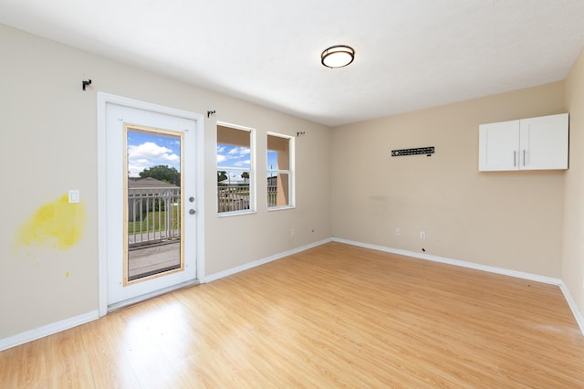 empty room featuring light hardwood / wood-style floors