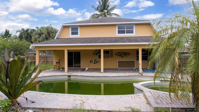 rear view of property with a patio