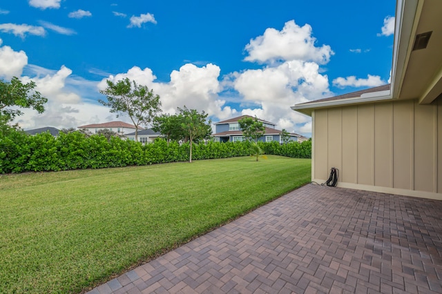 view of yard with a patio area