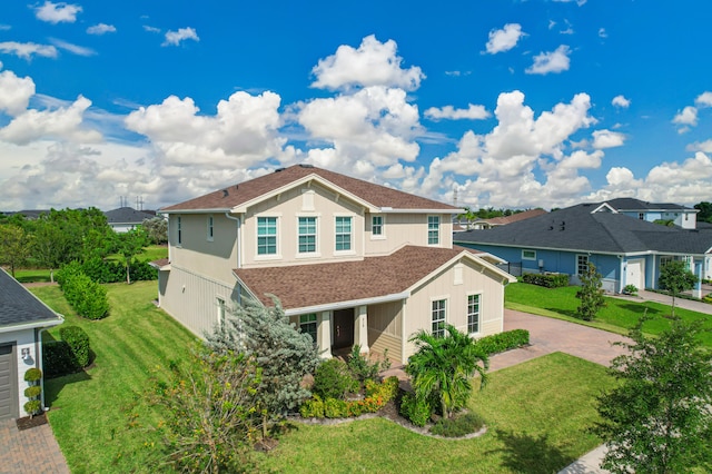 view of front of home with a front lawn