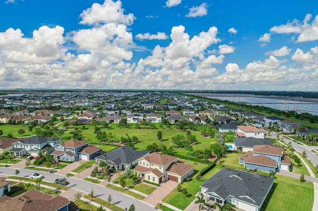 drone / aerial view with a water view