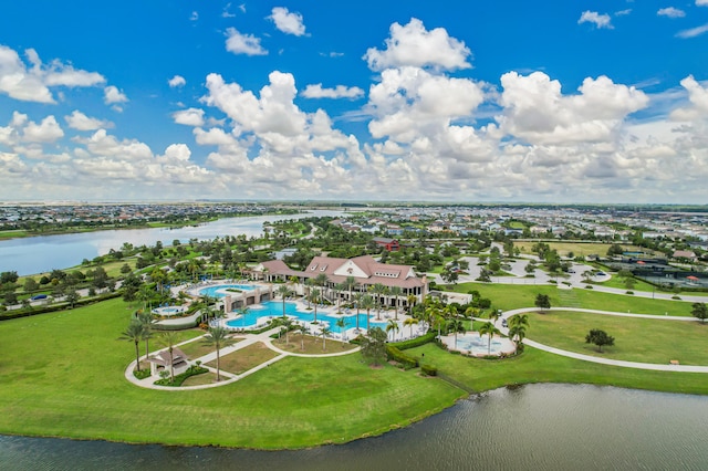 birds eye view of property with a water view