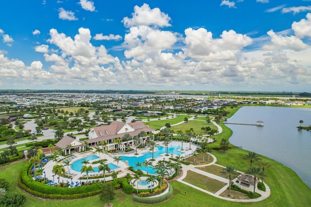 birds eye view of property with a water view