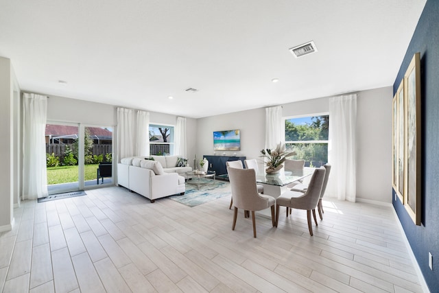 dining room featuring light hardwood / wood-style floors